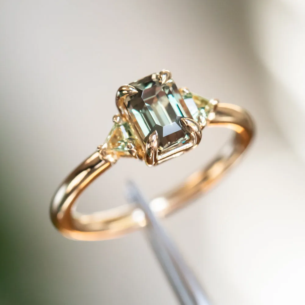 1.56ct Emerald Cut Tanzanian Sapphire and Parti Sapphire Shield Three Stone Ring in 14k Yellow Gold