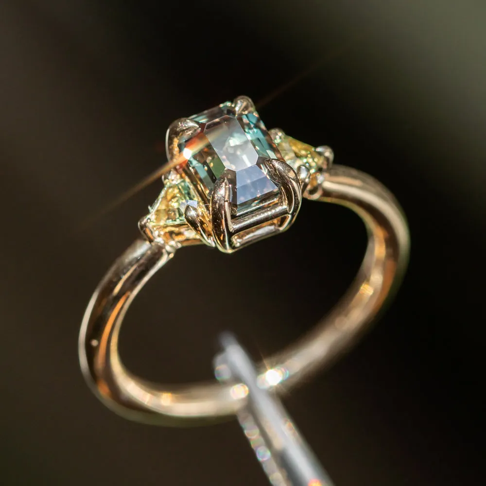 1.56ct Emerald Cut Tanzanian Sapphire and Parti Sapphire Shield Three Stone Ring in 14k Yellow Gold