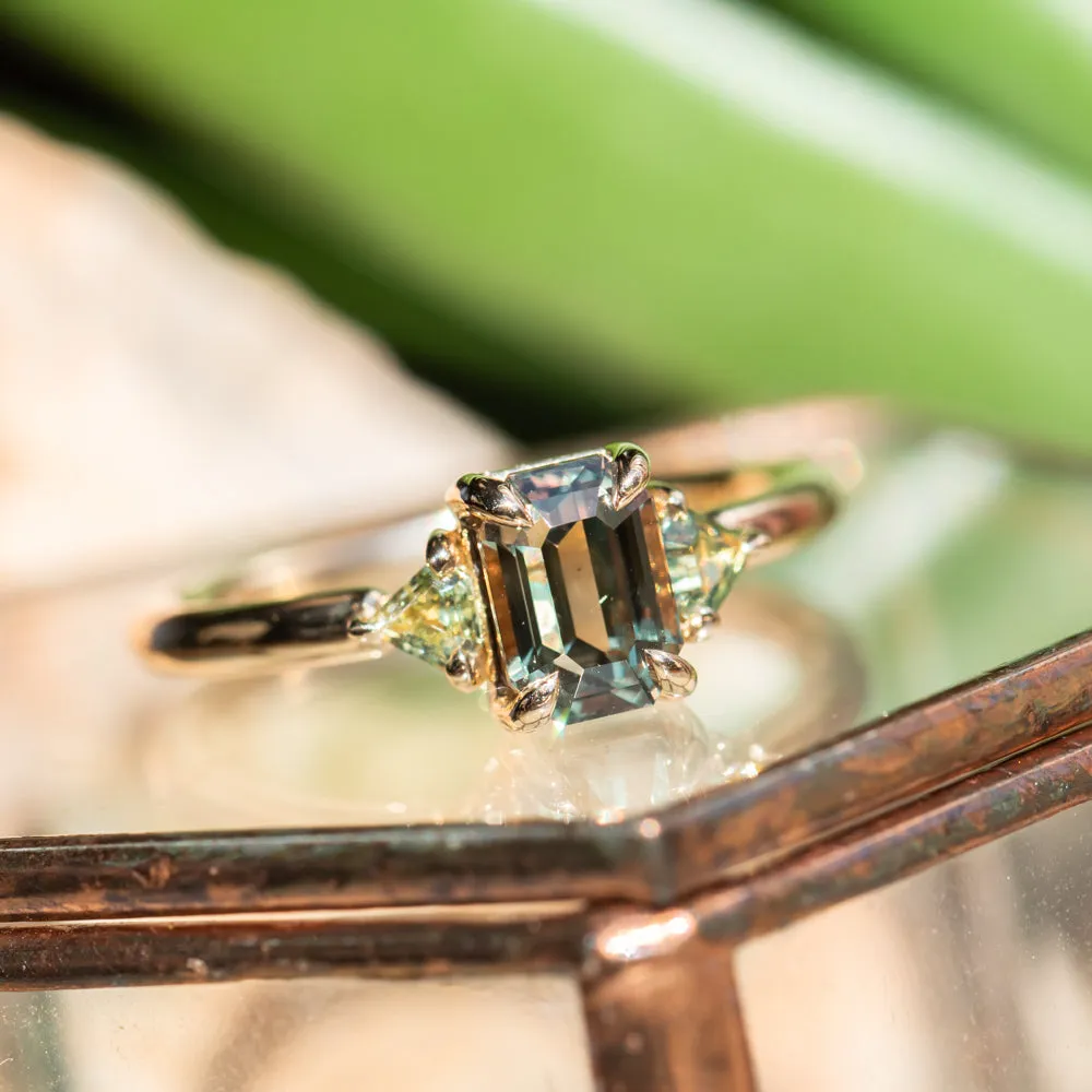 1.56ct Emerald Cut Tanzanian Sapphire and Parti Sapphire Shield Three Stone Ring in 14k Yellow Gold